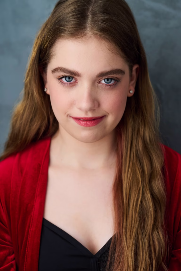 Teen actor, singer, and dancer, Sarah Genne, smiling in a headshot